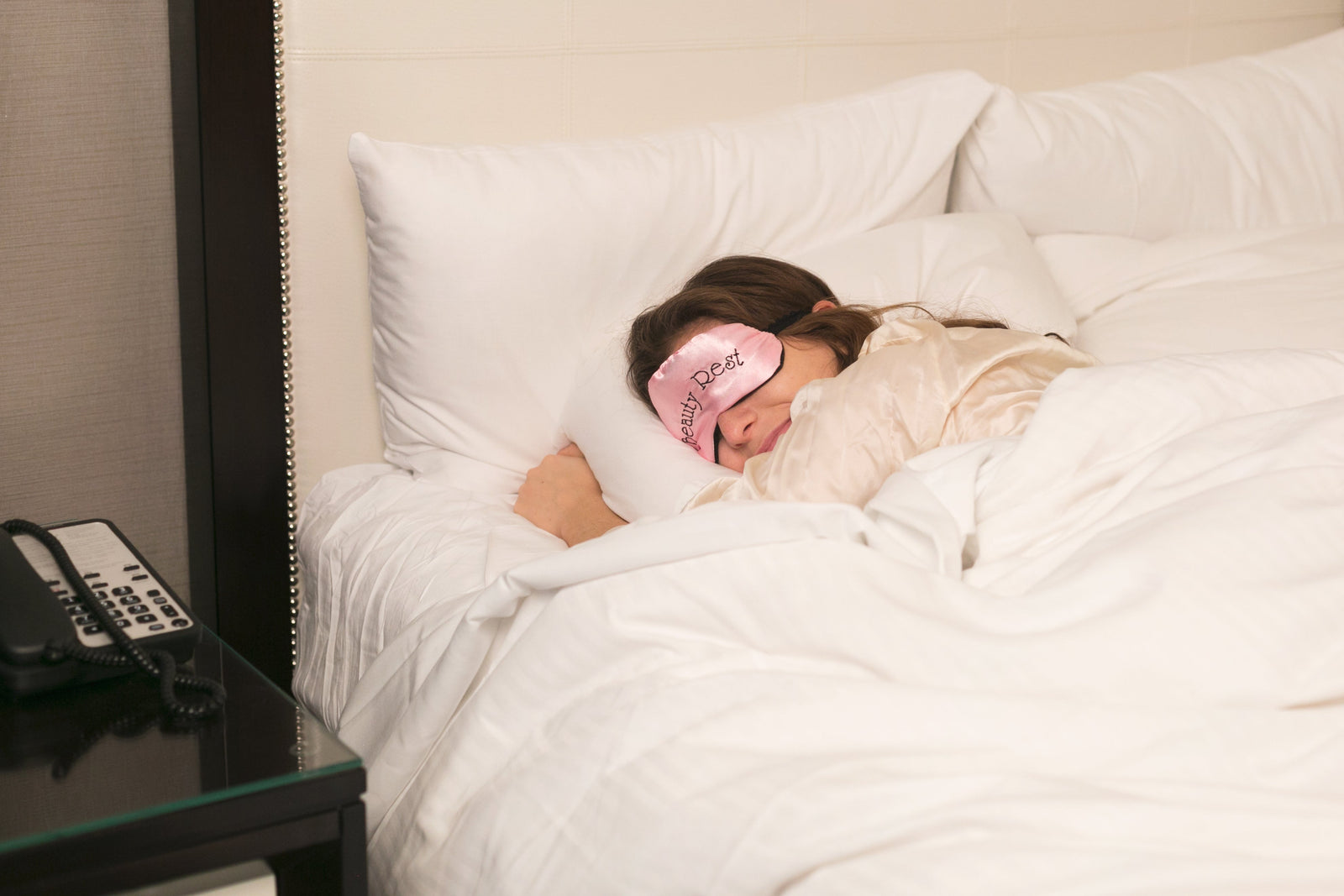 Blog banner showing a woman sleeping for the blog titled: How to Choose the Right Mattress Firmness for NZ Sleepers