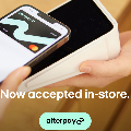 Hand holding a smartphone with a card, indicating the acceptance of Afterpay.