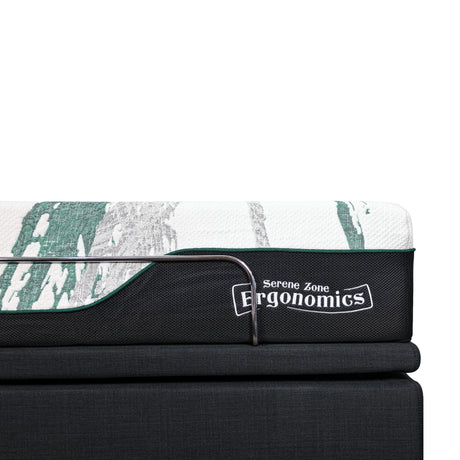 Mattress with 'Serene Zone Ergonomics' branding on a white background in close up.